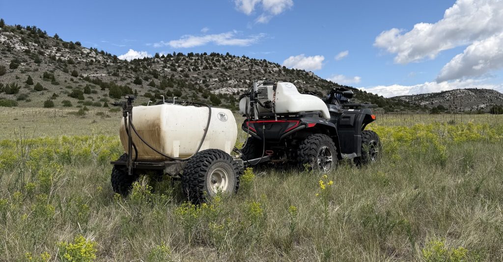 IMG_0145 Four-wheeler used for pasture weed management